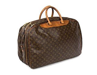 A Louis Vuitton Soft Sided Weekend Travel Bag Height 17 x width 23 inches.
