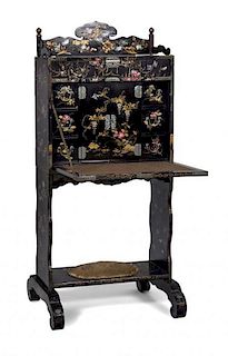 A Japanese Black and Gilt Lacquer Mother-of-Pearl Inlaid Writing Desk Height 53 x width 48 x depth 16 1/2 inches (closed).