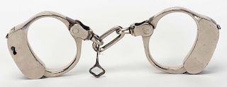 Bean Patrolman/Prison Handcuffs. American, late nineteenth century, bearing 1882/84/87 patent dates.
