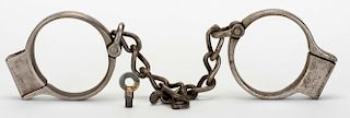 Bean Prison Leg Irons. American, late nineteenth century, bearing 1882 patent date. Nickel-plated le