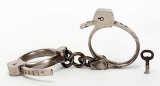 Tower сPinkertonо Detective Handcuffs. Late nineteenth century. Nickel-plated handcuffs, from the co