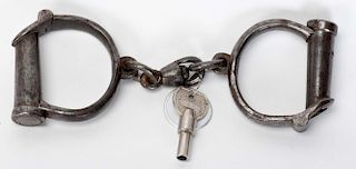 Darby Handcuffs. British, ca. 1900. With two newer keys. 8 _о long. Very good working condition. Dar