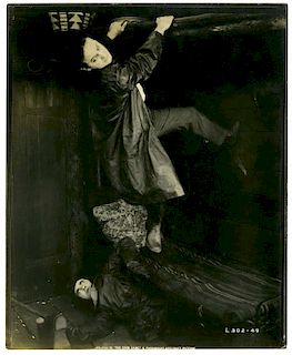 Houdini, Harry. Movie Still of Houdini in The Grim Game. Los Angeles: Paramount, [1919]. Sepia tone