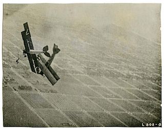 Houdini, Harry. Movie Still of Airplane Collision in The Grim Game. Los Angeles: Paramount, [1919].