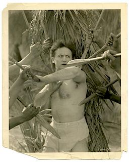 Houdini, Harry. Movie Still of Houdini Fighting Natives Before Capture in Terror Island. Los Angeles