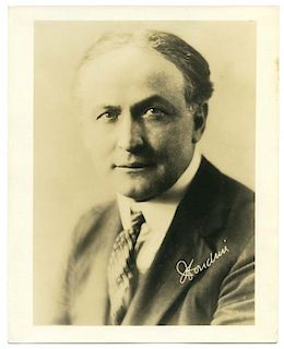 Houdini, Harry. Sepia Tone Vintage Publicity Photo of Houdini. Circa 1924. Formal studio bust portra