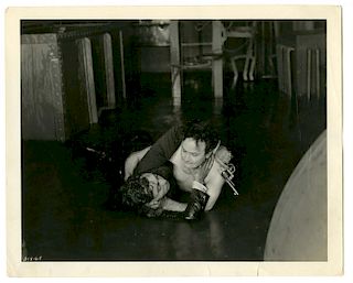 Houdini, Harry. Movie Still of Houdini Fighting for his Life in Terror Island. Los Angeles, [1920].
