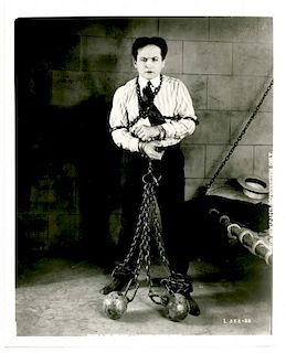 Houdini, Harry. Press Photo of Houdini in The Grim Game. Los Angeles, [1919]. Silver print movie sti