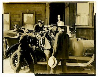 Houdini, Harry. Movie Still of Houdini in The Grim Game. Los Angeles, [1919]. Sepia tone photo depic