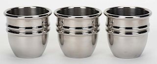 Busby Stainless Steel Paul Fox Cups. Wallace, Idaho: Jeff Busby Magic, ca. 1990. Three machine-made