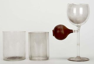 [Glassware] Two Hand-Blown Trick Glasses. Circa 1930s. Including a double-walled self-filling and dr