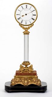 Robert-Houdin Glass Column Mystery Clock. Paris, circa 1850. A transparent glass 5о dial in round br