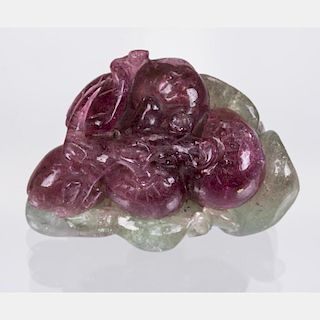 A Chinese Carved Tourmaline Berry Cluster,