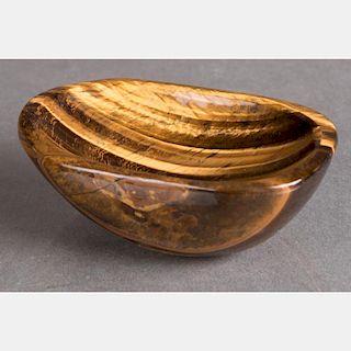 A Carved Tiger's Eye Snuff Dish.