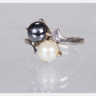 A 10kt. White Gold, White and Black Pearl Ring,