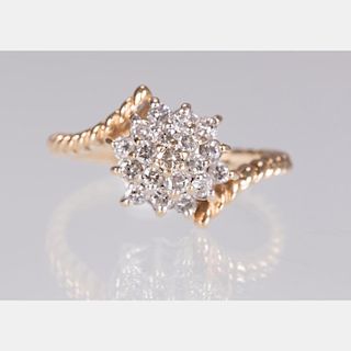A 14kt. Yellow Gold and Diamond Melee Ring,