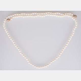 An 18kt. Yellow Gold, Diamond and Pearl Necklace,