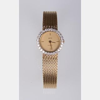An Austin Quartz 14kt. Yellow Gold and Diamond Ladies Wrist Watch,