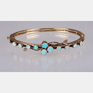 A 14kt. Yellow Gold and Opal Bangle Bracelet,