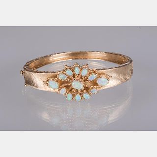A 14kt. Yellow Gold and Opal Bangle Bracelet,