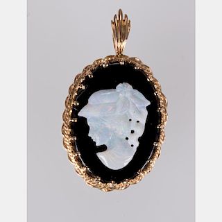A 14kt. Yellow Gold and Onyx Cameo Pendant,