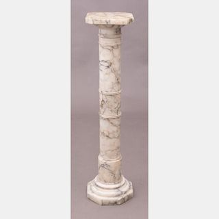 A Carved Alabaster Column Form Pedestal, 20th Century.