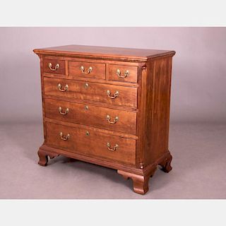 A Stickley Cherry Chest of Drawers, 20th Century.