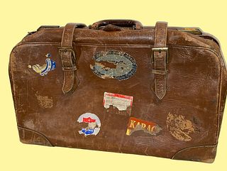 Vintage Leather Suitcase with Travel Stickers