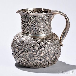 Whiting Sterling Silver Pitcher, New York, late 19th/early 20th century, repousse-decorated throughout with various flowers, ht. 8 in.,