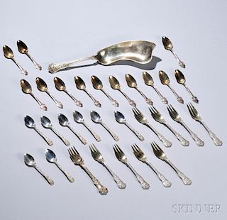 Thirty-one Pieces of American Sterling Silver Flatware, eighteen Tiffany & Co. pieces: nine "Olympian" pattern pieces including a crumb