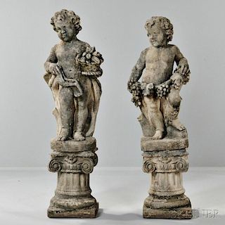 Pair of Stone Putti Figures with Fruit
