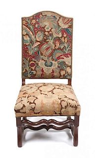 * A French Provincial Tapestry Upholstered Walnut Fauteuil Height 42 1/2 inches.