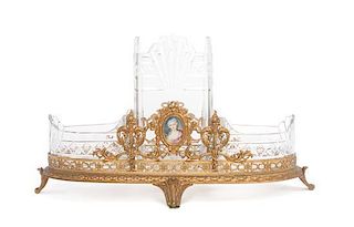 * A Continental Gilt Bronze and Cut Glass Centerpiece Length 18 inches.