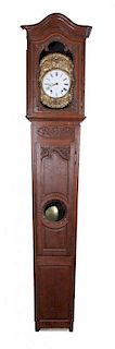 * A French Punched Brass and Mahogany Tall Case Clock Height 87 1/2 x width 18 3/4 x depth 10 inches.