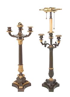 * An Empire Gilt and Patinated Bronze Four-Light Candelabra Height of first 26 1/2 inches.
