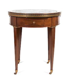 * An Empire Style Drum Table Height 29 x diameter 25 1/2 inches.