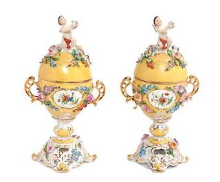 A Pair of Royal Vienna Covered Urns Height 9 1/4 inches.