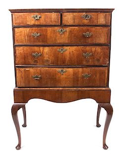 * A George I Walnut Chest on Stand Height 55 3/4 x width 37 1/2 x depth 20 1/2 inches.