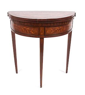 * A Regency Mahogany and Marquetry Flip-Top Tea Table Height 30 x width 28 1/2 x depth 14 1/4 inches.