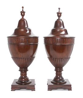 A Pair of Edwardian Knife Boxes Height of each 27 inches.