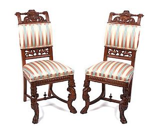 A Pair of Victorian Oak Side Chairs Height 42 1/4 inches.