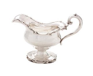 An American Silver Creamer, Black Starr & Frost, New York, NY, Early 20th Century, having scrolling foliate rim and handle, rais