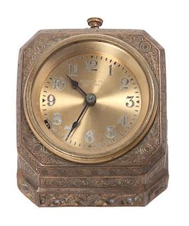 * A Tiffany Studios Bronze Desk Clock Height 2 3/4 x width 4 x depth 4 inches.