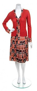 * A Carolina Herrera Brown and Orange Skirt Ensemble, Skirt size 8, sweater size S.