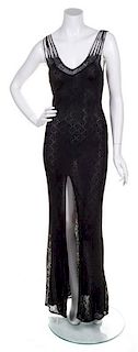 * A Christian Dior Black Gown, Size 8.