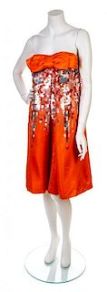 * A Christian Dior Orange Strapless Silk Dress, Size 6.