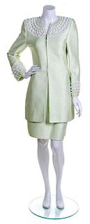 A Mary McFadden Light Green Skirt Suit, Size 10.