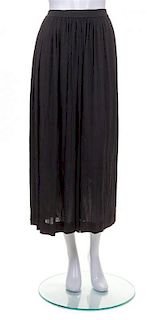 An Yves Saint Laurent Black Skirt, Size 38.