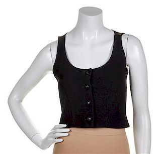 * A Chanel Black Boucle Cropped Vest, Size 36.