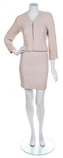 * A Chanel Peach Tweed Boucle Skirt Suit, Size 36.
